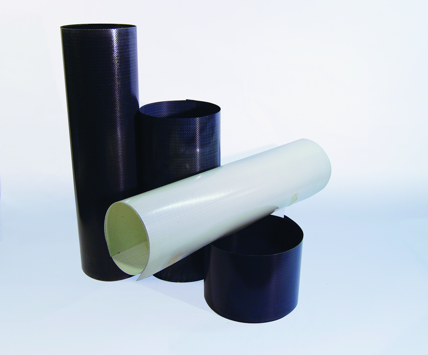 Fig. 2: Sample rolls of PileMedicTM carbon and glass laminates Comparison of Tensile Strength with